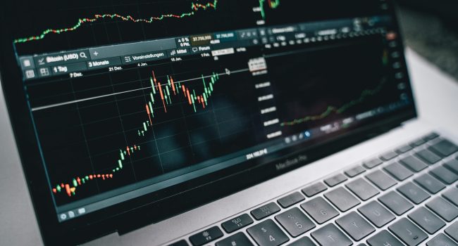 Close-up of a financial graph on a laptop screen, depicting stock market analysis in Berlin.